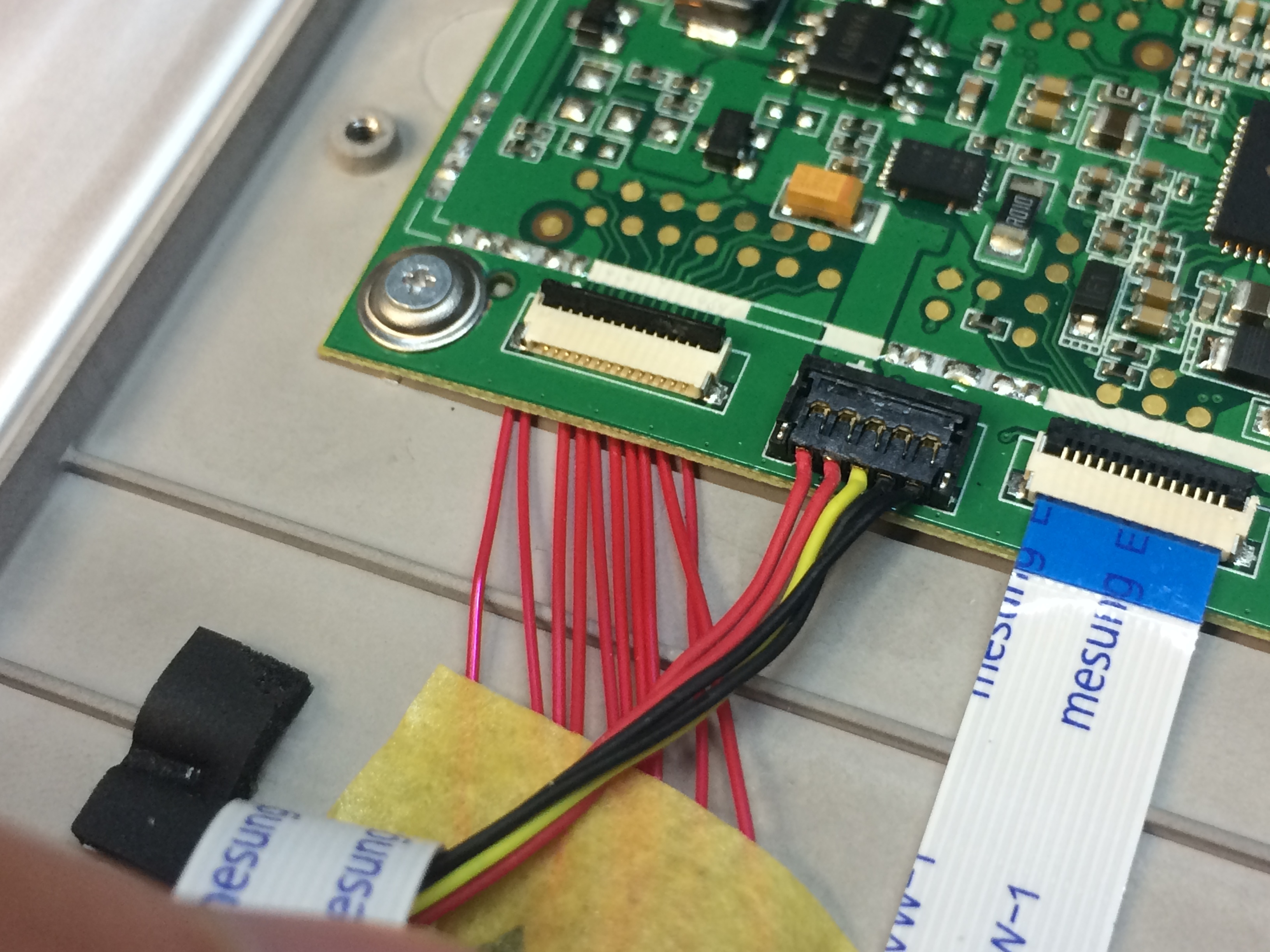 Wires underneath logic board